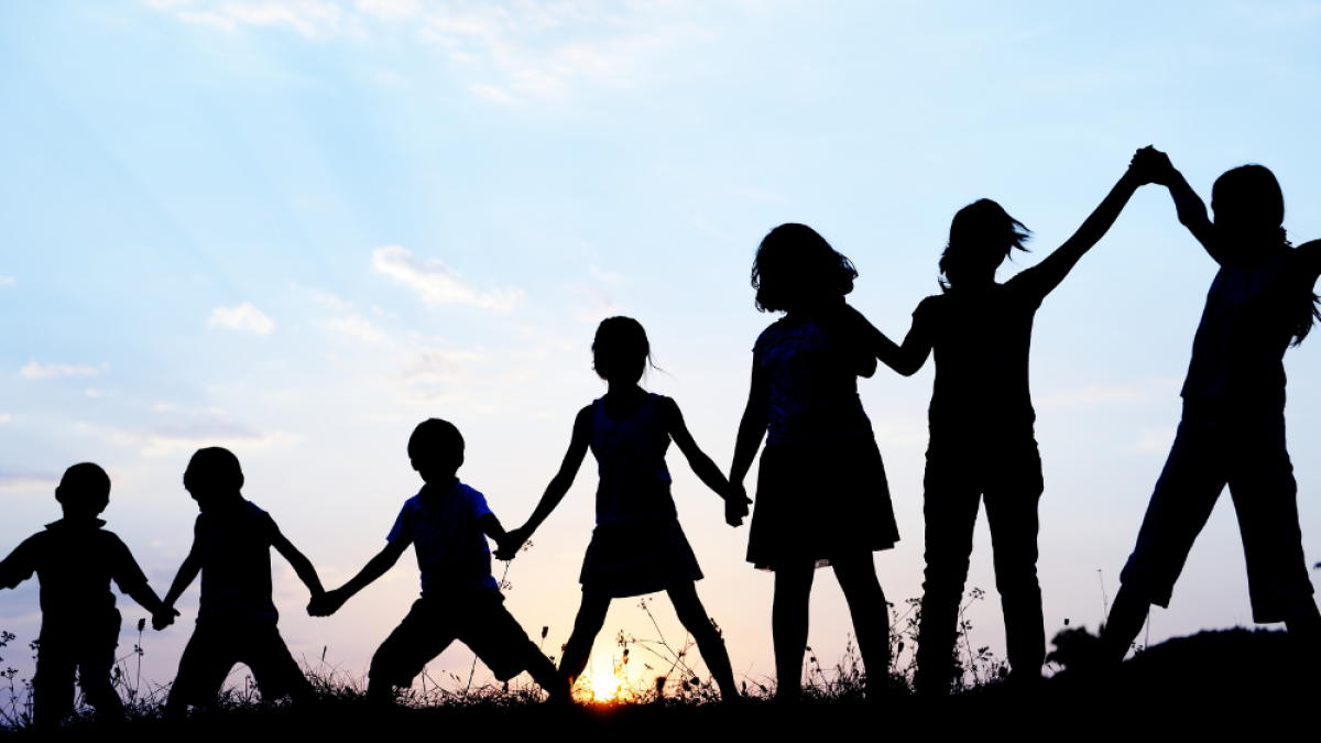 Youth Standing on Hill